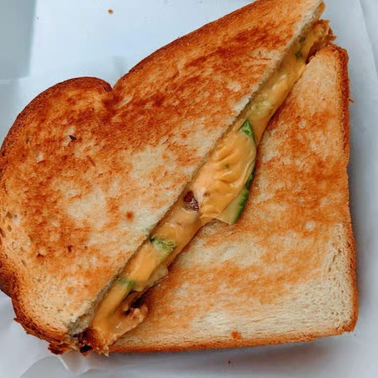 Ultimate Grilled Cheese Sandwich with Small Sea Salt Fries.